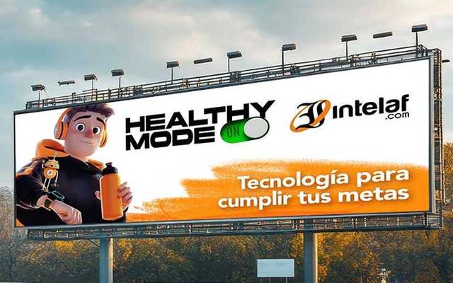 Intelaf, valla Healthy Mode On: personaje animado con audífonos y botella junto al lema Tecnología para cumplir tus metas